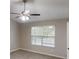 Bedroom with window and ceiling fan with lighting at 2740 Ashley Downs Ln, Atlanta, GA 30349
