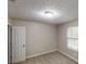 Neutral bedroom with a window and carpet flooring at 2740 Ashley Downs Ln, Atlanta, GA 30349