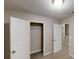 Bedroom with a closet and doors, carpet flooring at 2740 Ashley Downs Ln, Atlanta, GA 30349