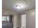 Dining room with gray tile floors and a light fixture at 2740 Ashley Downs Ln, Atlanta, GA 30349