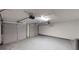 Two car garage with overhead door at 2740 Ashley Downs Ln, Atlanta, GA 30349