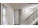 Hallway with a staircase, closet and interior doors at 2740 Ashley Downs Ln, Atlanta, GA 30349
