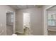 Neutral hallway with views into the rooms and a bathroom at 2740 Ashley Downs Ln, Atlanta, GA 30349