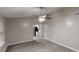 Open concept living room and kitchen with lots of light and neutral wall color at 2740 Ashley Downs Ln, Atlanta, GA 30349