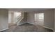 Spacious living room with tile floors, a staircase, and an open layout at 2740 Ashley Downs Ln, Atlanta, GA 30349