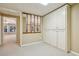 Basement space with neutral carpeting, large storage cabinets and ample open area at 3925 Waterford Dr, Suwanee, GA 30024