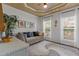 Inviting sitting area with plush seating, natural light, and tasteful decor, offering a cozy retreat at 4013 Suwanee Place Dr, Suwanee, GA 30024