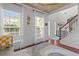 Bright sitting area with hardwood floors, elegant decor, and views of the entry, offering a warm welcome at 4013 Suwanee Place Dr, Suwanee, GA 30024