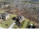 Beautiful aerial view of home showcasing the lawn, landscaping and proximity to trees at 4538 Sterling Pointe Nw Dr, Kennesaw, GA 30152