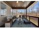 Relaxing covered porch furnished with comfortable outdoor seating at 4538 Sterling Pointe Nw Dr, Kennesaw, GA 30152