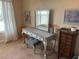 Bright dressing room with large mirror, vanity, and decorative paintings at 4538 Sterling Pointe Nw Dr, Kennesaw, GA 30152