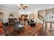 Spacious living area boasts hardwood floors, fireplace, with seamless flow to kitchen at 4538 Sterling Pointe Nw Dr, Kennesaw, GA 30152