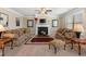Cozy living room features a fireplace, plush seating, and warm, inviting decor at 4538 Sterling Pointe Nw Dr, Kennesaw, GA 30152