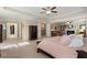 Expansive main bedroom with sitting area, fireplace, tray ceilings, and generous closet space at 4538 Sterling Pointe Nw Dr, Kennesaw, GA 30152
