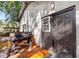 Cozy wooden deck with a black grill next to the door for outdoor cooking at 1340 Hawthorne Se Ave, Smyrna, GA 30080