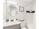 Bright bathroom featuring a modern vanity, neutral colors, and a shower-tub combination at 1340 Hawthorne Se Ave, Smyrna, GA 30080
