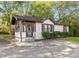 Charming brick home featuring a cozy screened-in porch and a well-kept lawn at 1340 Hawthorne Se Ave, Smyrna, GA 30080