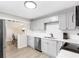 Modern kitchen with stainless steel appliances and sleek gray cabinets at 1340 Hawthorne Se Ave, Smyrna, GA 30080