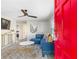 Bright living room featuring stylish decor and a modern ceiling fan at 1340 Hawthorne Se Ave, Smyrna, GA 30080