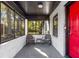 Relaxing screened porch with comfortable seating and ample natural light at 1340 Hawthorne Se Ave, Smyrna, GA 30080