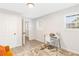 This office space features gray walls, modern desk and chair, natural light, and decor at 1340 Hawthorne Se Ave, Smyrna, GA 30080