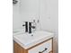 Stylish bathroom with a sleek vanity, modern faucet, and decorative soap dispensers at 2424 Memorial Se Dr # 3, Atlanta, GA 30317
