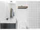 Bathroom features a sleek single sink vanity with modern fixtures and shower at 2424 Memorial Se Dr # 3, Atlanta, GA 30317