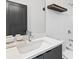 Bathroom featuring a stylish single sink vanity, quartz counters, and modern fixtures at 2424 Memorial Se Dr # 3, Atlanta, GA 30317