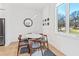 Cozy dining area with modern table and chairs near a bright window at 2424 Memorial Se Dr # 3, Atlanta, GA 30317