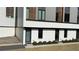 Modern townhome with painted brick and stylish gray and wood accents at 2424 Memorial Se Dr # 3, Atlanta, GA 30317