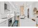 Sleek modern kitchen with stainless steel appliances and a large center island at 2424 Memorial Se Dr # 3, Atlanta, GA 30317