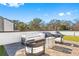 Inviting rooftop deck featuring stylish outdoor furniture and artificial turf for entertaining and relaxation at 2424 Memorial Se Dr # 3, Atlanta, GA 30317