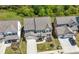 A beautiful aerial view of a two-story home featuring a well-manicured lawn and an attached two-car garage at 2770 Westgate Park Dr, Loganville, GA 30052