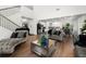Beautiful open-concept living area featuring a staircase, kitchen, and dining room at 2770 Westgate Park Dr, Loganville, GA 30052