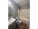Bathroom featuring a bathtub and sink with modern features, offering a relaxing space at 3870 Spring Moss Cir, Snellville, GA 30039