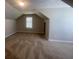 Inviting carpeted bedroom with natural light and clean walls, offering a comfortable environment at 3870 Spring Moss Cir, Snellville, GA 30039