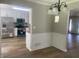 Bright dining area showcasing contemporary lighting and wainscoting detail at 3870 Spring Moss Cir, Snellville, GA 30039