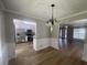 Inviting dining area with a view of the updated kitchen and a bright living space at 3870 Spring Moss Cir, Snellville, GA 30039