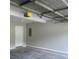 The garage has freshly painted walls and a clean, empty space at 3870 Spring Moss Cir, Snellville, GA 30039