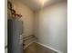 Utility room featuring a water heater with plumbing fixtures at 3870 Spring Moss Cir, Snellville, GA 30039
