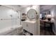 Stylish bathroom featuring a walk-in shower, patterned tile flooring, and a vanity with ample storage providing a relaxing experience at 640 Saddle Ridge Trce, Roswell, GA 30076