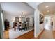 Elegant dining room with hardwood floors, chandelier, and space for entertaining at 640 Saddle Ridge Trce, Roswell, GA 30076