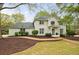 Beautiful two-story home with a brick facade, well-maintained landscaping, and inviting entryway at 640 Saddle Ridge Trce, Roswell, GA 30076