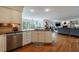 Open kitchen boasts stainless steel appliances, granite counters and opens to the living area at 640 Saddle Ridge Trce, Roswell, GA 30076