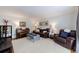 Cozy living room with comfortable seating, natural light, and a relaxed atmosphere at 640 Saddle Ridge Trce, Roswell, GA 30076