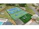 Overhead view of tennis and basketball courts, plus a playground, all fenced in and surrounded by green spaces at 640 Saddle Ridge Trce, Roswell, GA 30076