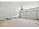Spacious two-car garage features high ceilings and ample storage at 1019 Cooks Farm Way, Woodstock, GA 30189