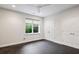 Bright bedroom featuring a ceiling fan, neutral walls, and a window with natural light at 369 Pinecrest Ne Rd, Atlanta, GA 30342