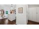 The closet is large with custom shelving, storage and an island in the center at 369 Pinecrest Ne Rd, Atlanta, GA 30342