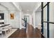 Grand foyer showcasing herringbone wood floors, white trim, and staircase in view at 369 Pinecrest Ne Rd, Atlanta, GA 30342
